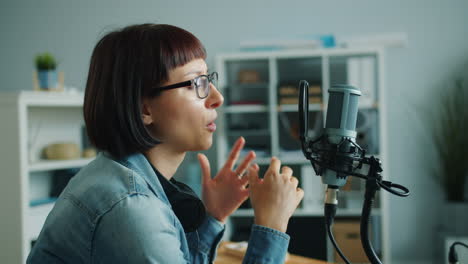 woman recording podcast episode
