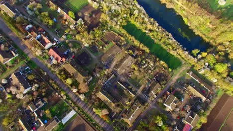 aerial view of beautiful streets, houses and colorful gardens