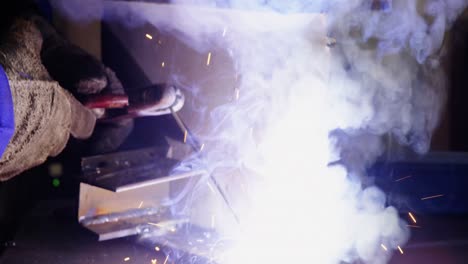 welder welding a metal