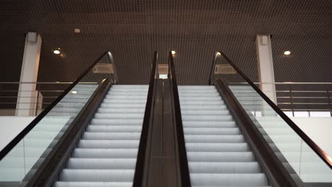 modern escalator in a large building