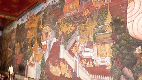 detailed mural depicting thai mythology and architecture