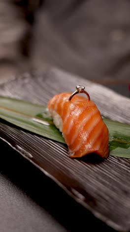 engagement ring on sushi