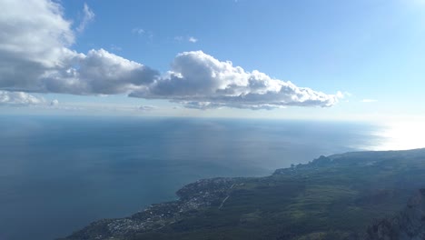 coastal mountain view with clouds