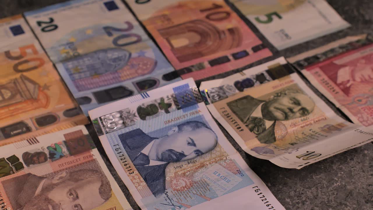 Bulgaria change currency, Bulgaria Lev to Euro. Money exchange. Paper banknotes on table. Concept, economy, competition, crisis, banking and finance. BGN,BGL. Scene C. Close up slide shot