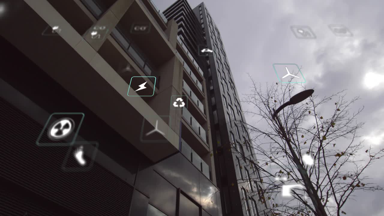 Icone dell'energia che si sollevano in primo piano mentre la telecamera si inclina verso l'alto, mostrando i dati energetici dell'edificio
