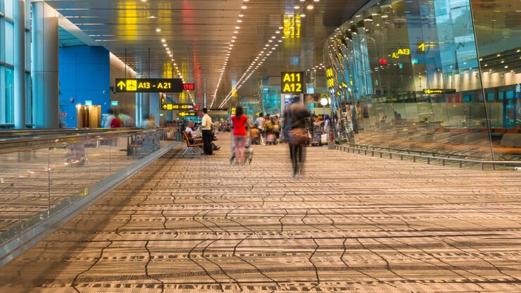 Time lapse footage of passengers in Changi international airport in Singapore