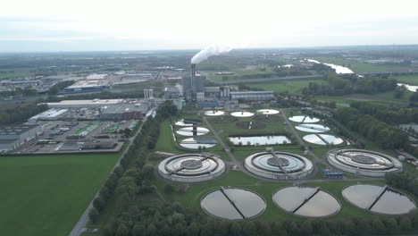 high aerial overview of water treatment plant in an industrial area