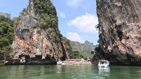 boat navigating through a majestic karst landscape