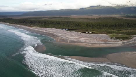 estuary at maori beach in bruce bay, west coast, south island, new zealand. - aerial shot
