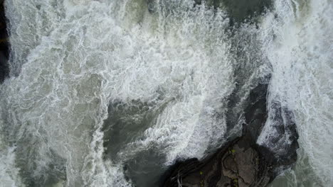 Aerial-View-Of-Abstract-Texture-Of-Flowing-River-Water-In-Alaska