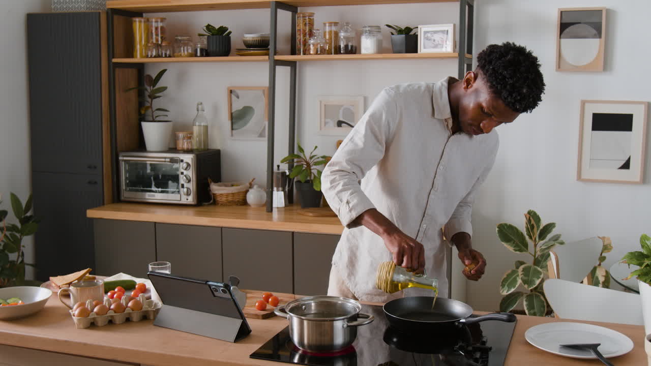 Man cooking in the kitchen at home