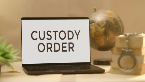 custody order displayed in legal laptop screen