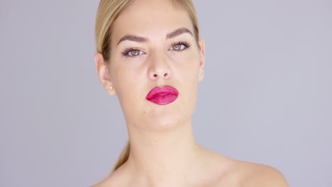 portrait of sensual blond girl with bare shoulders