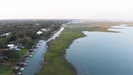 drone flying near woodland creek in sc at sunset