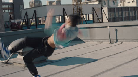 dancing man breakdancing on roof top hip hop dancer practicing dance routine performing freestyle moves in city