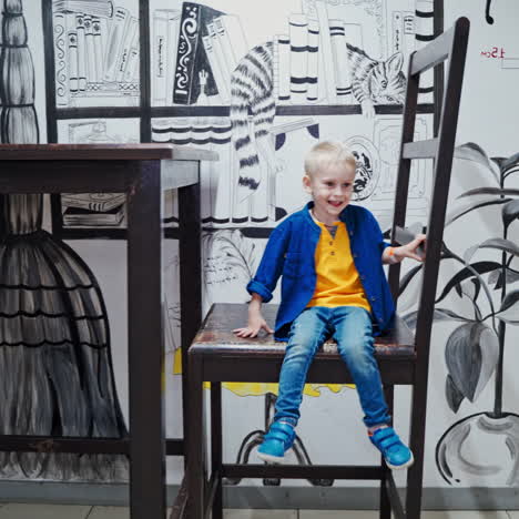 A boy plays in a science center. Science museum