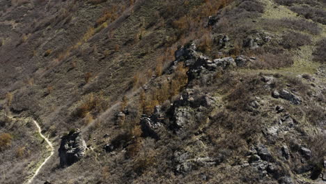 Reverse-aerial-drone-shot-of-Rock-Canyon-landscape-in-Utah