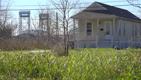 Houses stand amidst empty and undeveloped lots in the Lower 9th Ward of New Orleans Louisiana post Katrina 1
