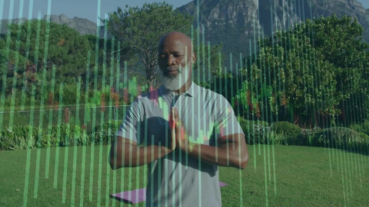Vertical video: Standing man praying on mountain lawn, in polo, pants, purple mat, audio-visualizer
