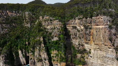 aerial: coast of tasmania with giant cliffs