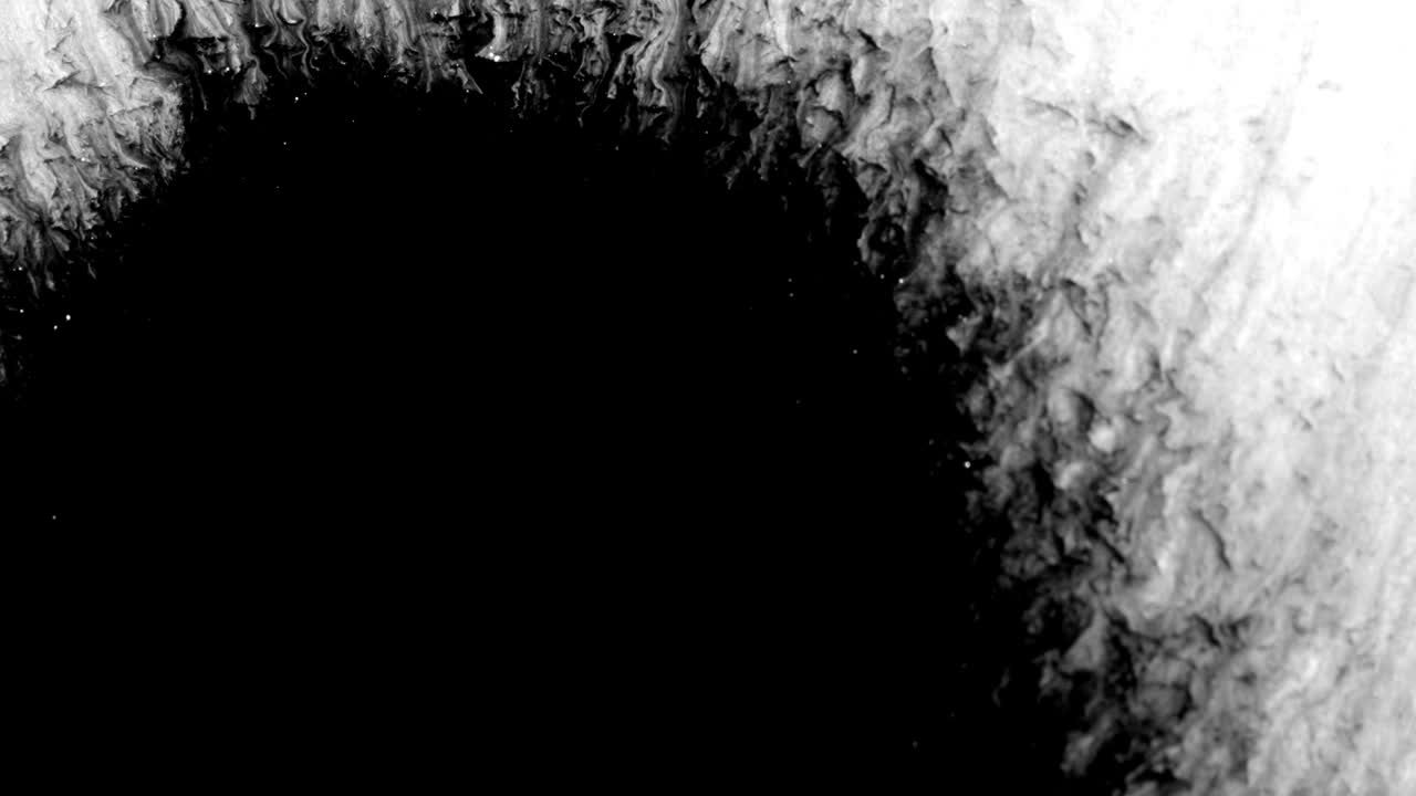 Black Ink Drop Design on White Background