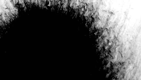 black ink drop design on white background