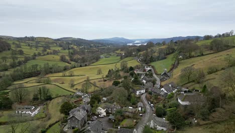 Cinematic-aerial-landscape-footage-of-the-small-village-of-Troutbeck-is-a-village-and-former-civil-parish,-now-in-the-parish-of-Lakes,-in-South-Lakeland-district-in-Cumbria,-England