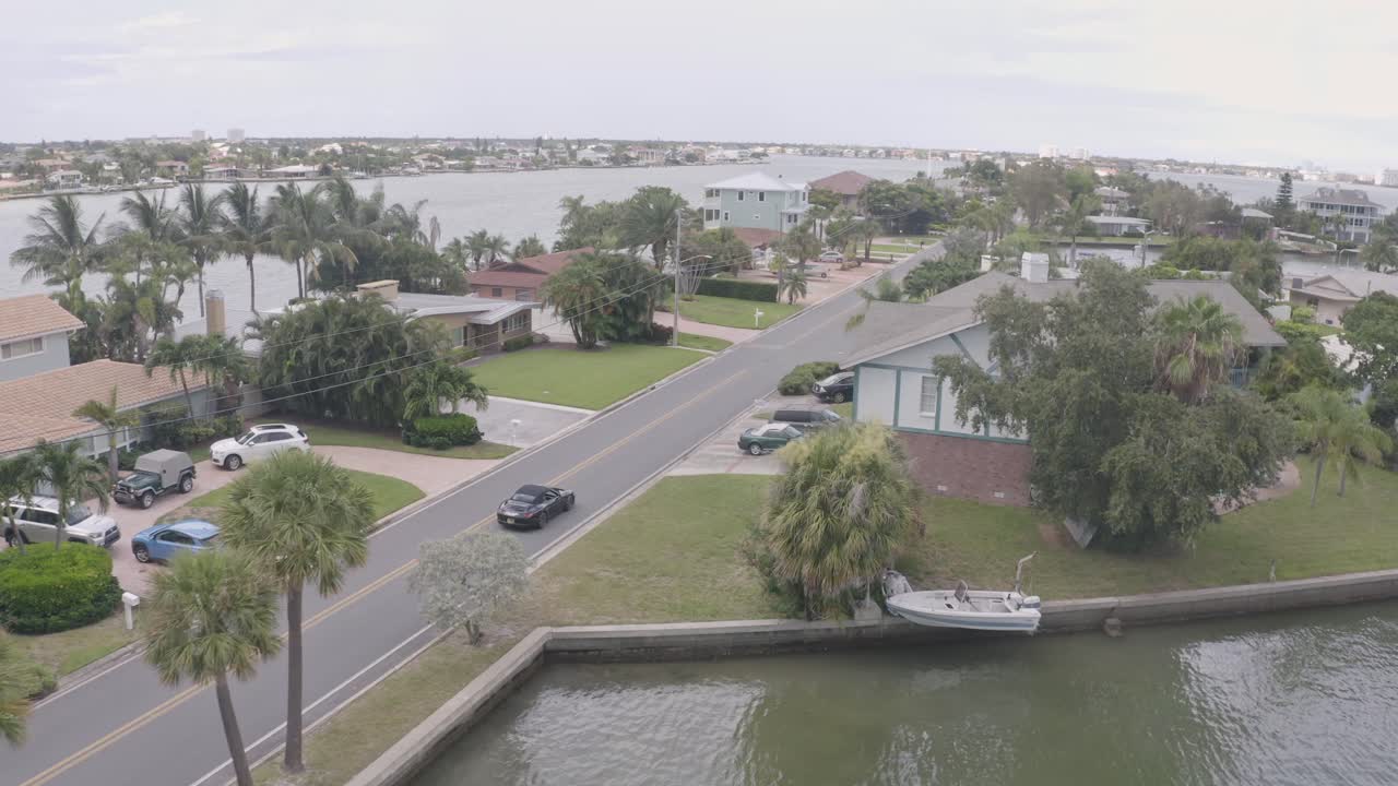 Porsche Carrera drive in residential neighborhoods of St Pete Beach, Florida USA