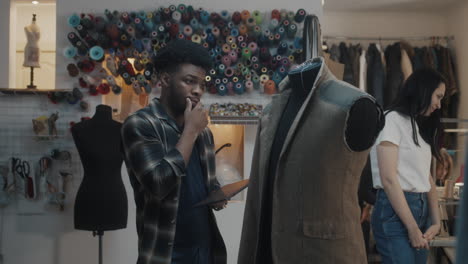 fashion designer discussing a design
