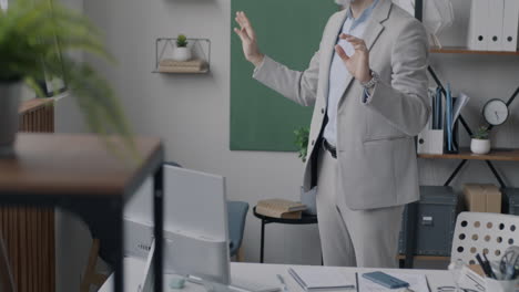 businessman using vr headset in office