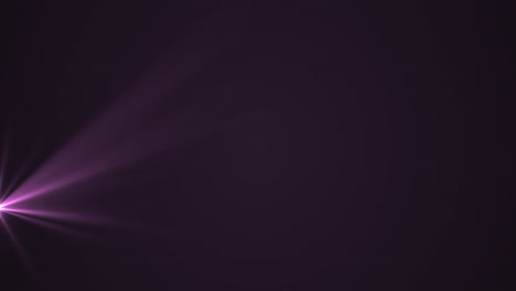 Glowing-purple-rays-of-light-moving-against-black-background