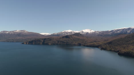 wide aerial view of lake lácar in the andean watershed. patagonia, argentina. 4k.