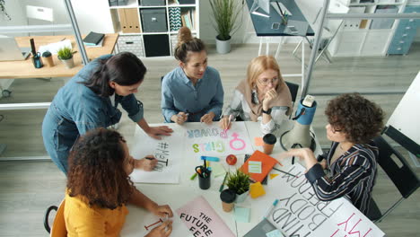 women brainstorming in a modern office
