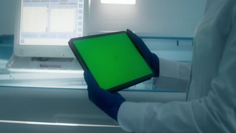 scientist using tablet in a laboratory setting