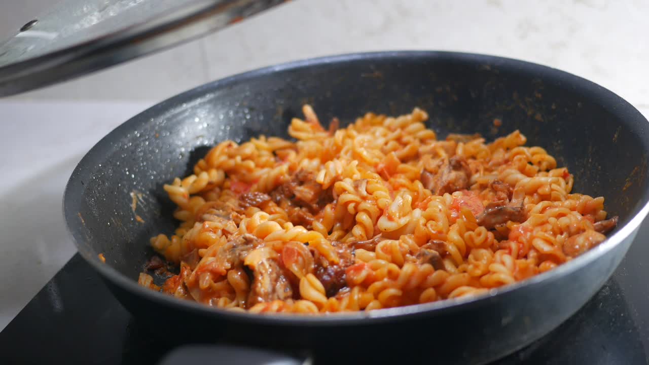 Pasta cooking in a pan