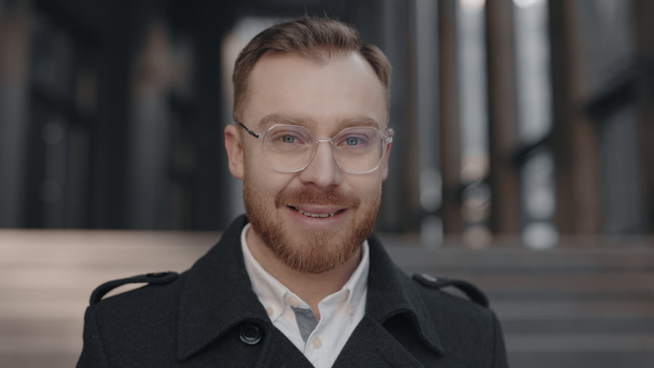 Portrait of a man with glasses and a beard