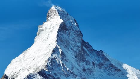 scenic view of snowcapped matterhorn mountain peak.