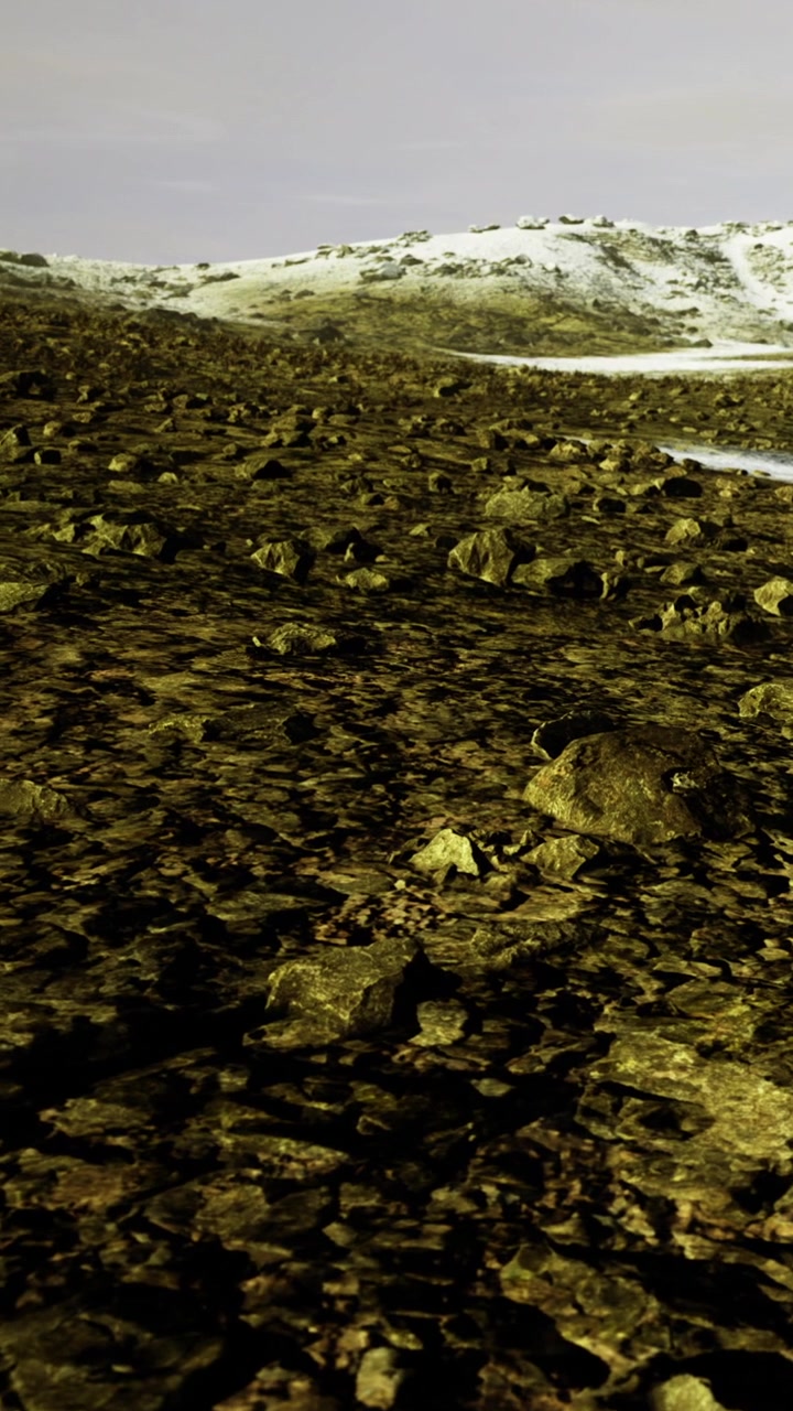 Rocce e terreno in un paesaggio brullo durante le ore diurne.