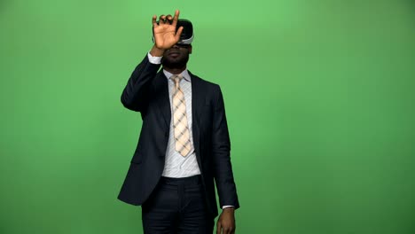 black man using vr glasses