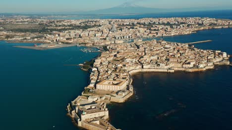 rising aerial shot of the city of syracuse in sicily