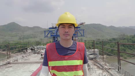 construction worker on bridge under construction