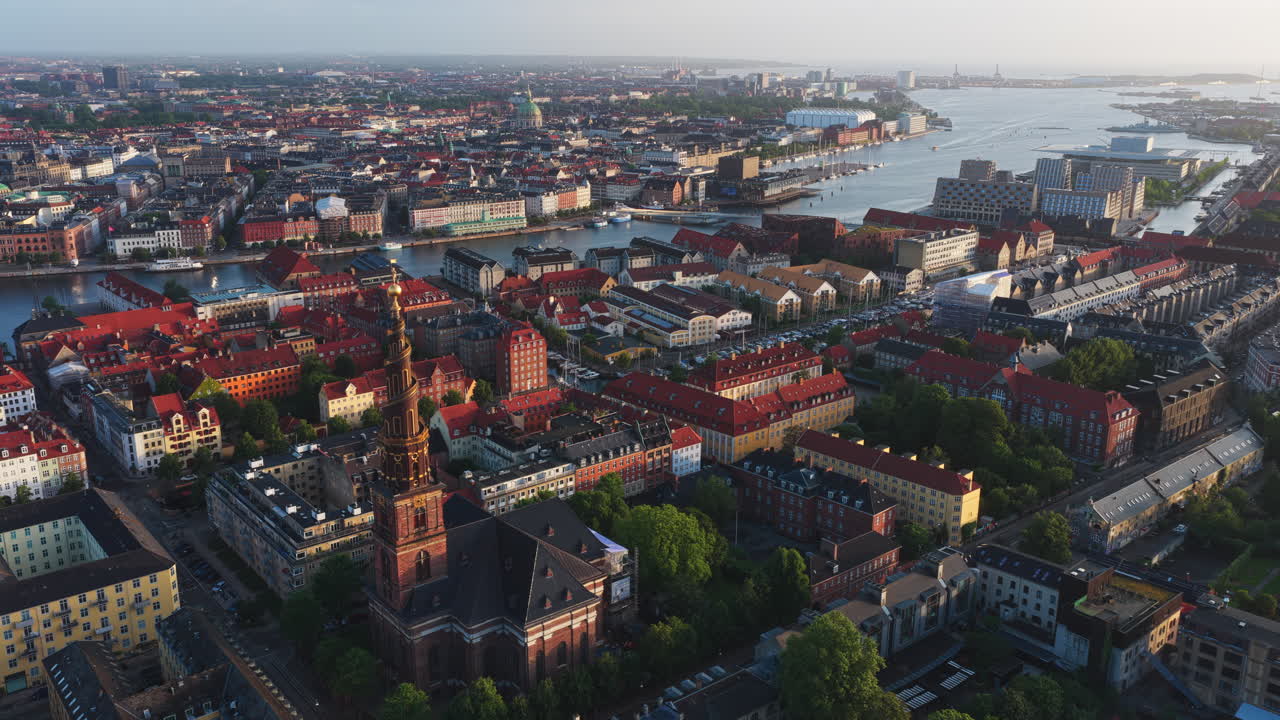 Aerial drone view of the iconic spiral tower of the Church of Our Saviour in Copenhagen, Denmark