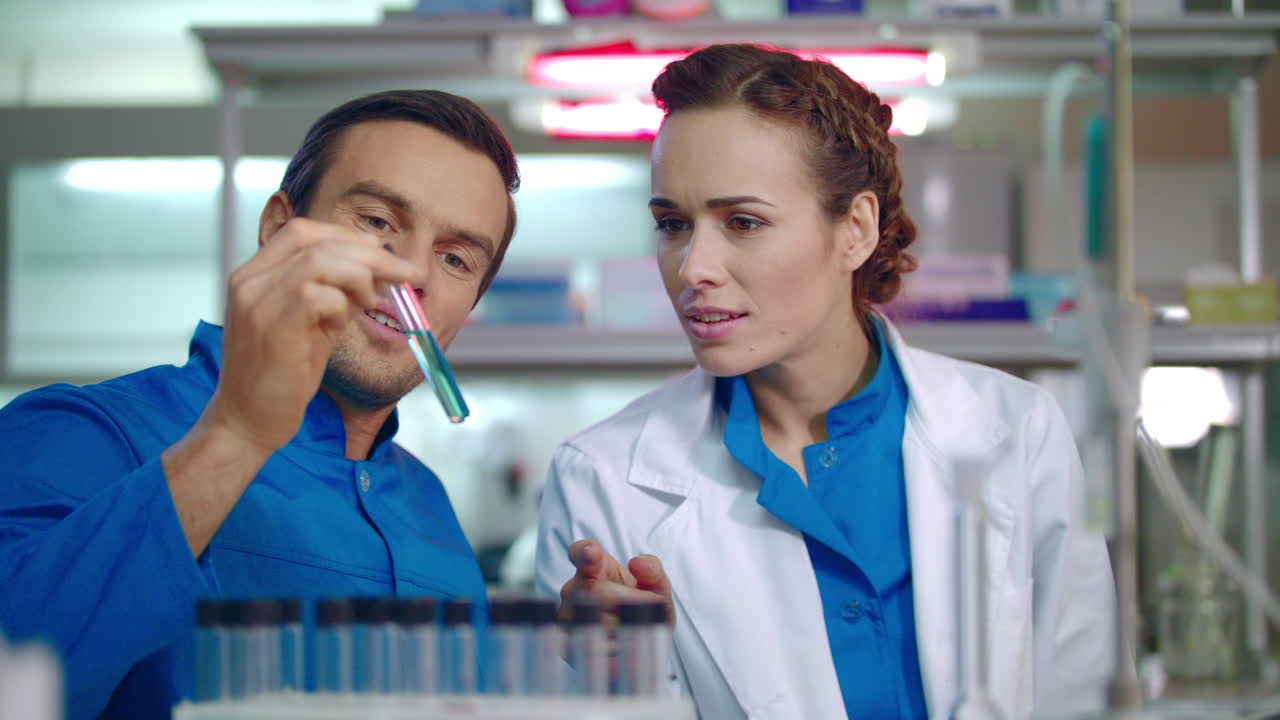 Chemists in lab. Science chemistry research