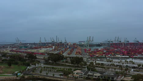 shipping containers at the industrial port at long beach, california - aerial view