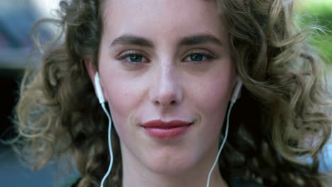 portrait of young woman listening to music