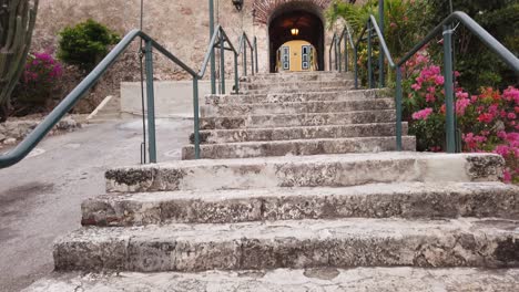 stone-brick stairs panning up towards the fort  entrance