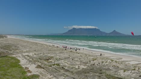 drone view of a kitesurf spot with table mountain in the background