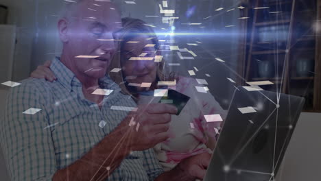 animación de la red de conexiones a través de una pareja que paga en línea utilizando una computadora portátil