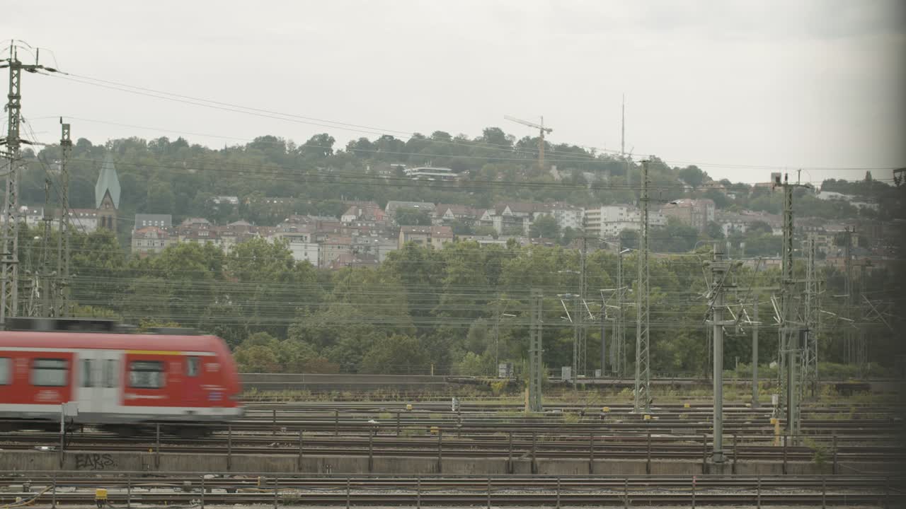 Train passing through a city landscape