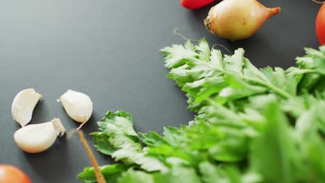 video of fresh vegetables with copy space over grey background